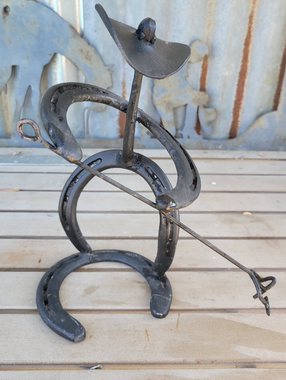 Handcrafted Black Horseshoe Musician Sculpture - Home Art